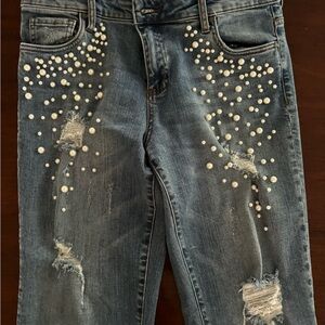 Pearl embodied ripped knee jeans